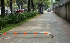 Điều chỉnh lại barie trên vỉa hè Quận 1