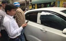 Hà Nội: Bóng bay nổ làm vỡ kính ô tô, một cháu bé bỏng mặt