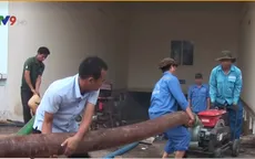 Nỗ lực giải cứu hàng trăm xe máy, ô tô bị ngập trong hầm chung cư