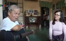 Người đàn ông mù làm đẹp cuộc sống với tiếng đàn guitar