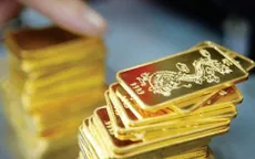 Giá vàng tiếp tục giảm, tỷ giá trung tâm tăng