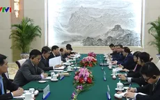 Trưởng ban Đối ngoại Trung ương Hoàng Bình Quân hội kiến Trưởng ban Đối ngoại Trung Quốc