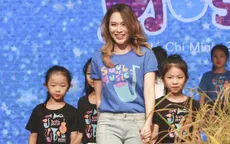 Mỹ Tâm rạng rỡ khi sải bước trên sàn diễn thời trang