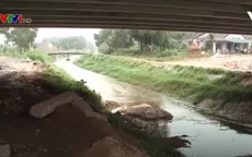 Đất đá từ đường cao tốc Đà Nẵng - Quảng Ngãi sạt xuống, kênh thủy lợi bị xé toạc nhiều đoạn