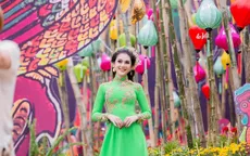Lâm Khánh Chi duyên dáng mặc áo dài đón Tết