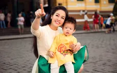 Nhật Kim Anh cùng con trai cưng diện áo dài dạo phố