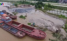 Xâm lấn dòng chảy gia tăng, đe dọa an toàn đê điều