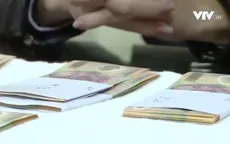 Thủ đoạn tiêu thụ tiền giả tại Việt Nam