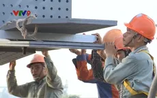 Hợp long hai nhịp biên cầu Vàm Cống