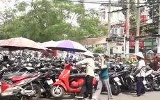 TP.HCM: Loạn giá giữ xe