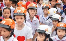 TP.HCM tuyên truyền đội mũ bảo hiểm cho trẻ em