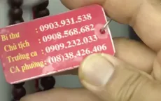 TP.HCM: Phát móc chìa khóa in số điện thoại lãnh đạo phường cho dân