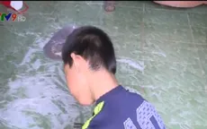 Giải cứu bé trai khuyết tật bị ngược đãi tại Vĩnh Long