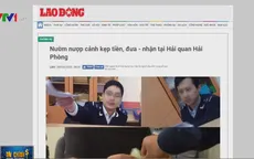 Tạm đình chỉ cán bộ hải quan có hình ảnh nhận tiền "bôi trơn"