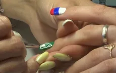 Trang trí móng tay cổ vũ bóng đá