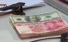 Đồng Nhân dân tệ giảm mạnh dấy lên nỗi lo ngại về cuộc chiến tranh tiền tệ