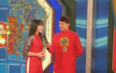 MC Trần Ngọc diện áo dài đỏ rực rỡ trong Hãy chọn giá đúng số Tết