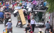 Xe máy vẫn là phương tiện mưu sinh của hàng triệu người