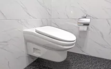Sáng chế bồn cầu dốc để ngăn ngồi lâu trong toilet