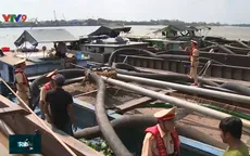 Thủ đoạn khai thác cát trái phép dưới chân cầu Mỹ Thuận