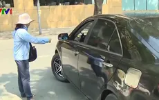 TP.HCM: Nên tiếp tục hay dừng đề án thu phí đỗ xe lòng đường?