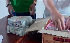 Bắt vụ vận chuyển 470.000 USD qua biên giới
