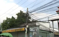 Bình Dương: Nhiều hộ dân bất an vì đường dây điện giăng ngang nhà