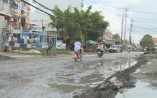 Quốc lộ 30 đầy rẫy ổ voi, nguy cơ tai nạn rình rập