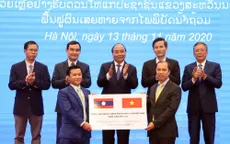 Trân trọng truyền thống "hạt gạo cắn đôi, cọng rau bẻ nửa" Việt-Lào