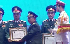 Trao tặng huân chương Nhà nước cho lãnh đạo quân đội Việt Nam - Lào