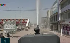 Iraq dùng súng vòi rồng diệt khuẩn