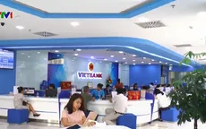Ngân hàng giảm phí dịch vụ hỗ trợ người dân và doanh nghiệp
