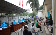 Hà Nội xét nghiệm nhanh sàng lọc COVID-19 cho tiểu thương chợ đầu mối Minh Khai