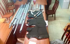 Thu giữ súng và nhiều loại hung khí tại tiệm cầm đồ ở TP.HCM