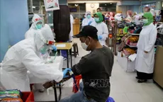 Số ca nhiễm mới COVID-19 trong ngày cao kỷ lục tại Indonesia