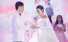 Á hậu Thúy Vân tiết lộ mang bầu con trai tại đám cưới