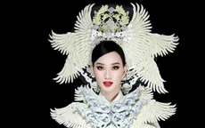 Ái Nhi trình diễn áo dài nặng 30kg tại Miss Intercontinental 2021