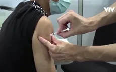 Pháp khuyến cáo tiêm vaccine phòng cúm và COVID-19 cùng lúc