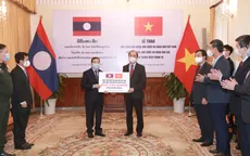 Việt Nam hỗ trợ khẩn cấp hơn 2 triệu USD và vật tư y tế cho Lào chống đợt COVID-19 mới