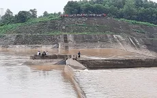 Cứu hộ thành công 7 người bị kẹt giữa đập tràn Nam Thạch Hãn