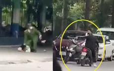 Bắt giữ thanh niên cầm dao chém xe cảnh sát, đòi "thả bạn tao ra"