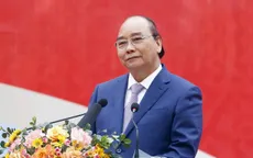 Chủ tịch nước Nguyễn Xuân Phúc trao quà Tết cho các hộ nghèo tại Đà Nẵng