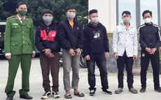 Trèo tường vào khu cách ly gặp bạn gái, đánh công an