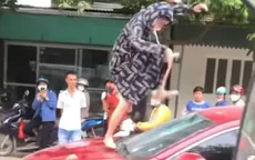 Công an làm việc với người phụ nữ đạp vỡ kính ô tô, cắn rách tai cô gái