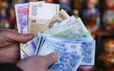 Ukraine hạn chế rút tiền mặt, cấm bán ngoại tệ cho người dân