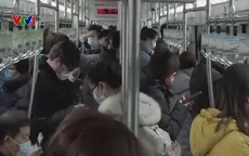 Người dân Bắc Kinh hối hả trở lại làm việc sau Tết