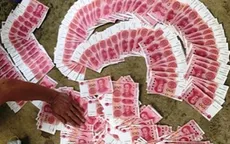Rủ nhau đi bán tiền Trung Quốc giả, hai chú cháu cùng bị bắt