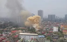 Hà Nội: Giải cứu 2 cháu nhỏ và 2 cụ già trong căn nhà 3 tầng bị cháy