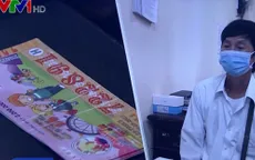Làm vé số trúng thưởng giả để... đổi tiền thật