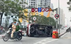 Điều tra vụ xe ô tô lật nghiêng tại cầu vượt Hoàng Minh Giám